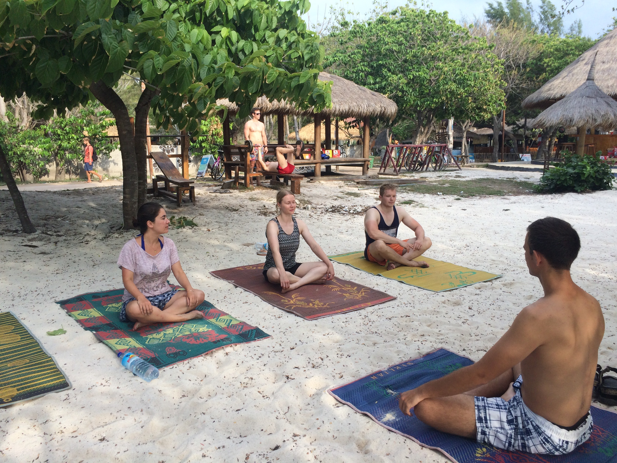 Sunset beach yoga by Manu