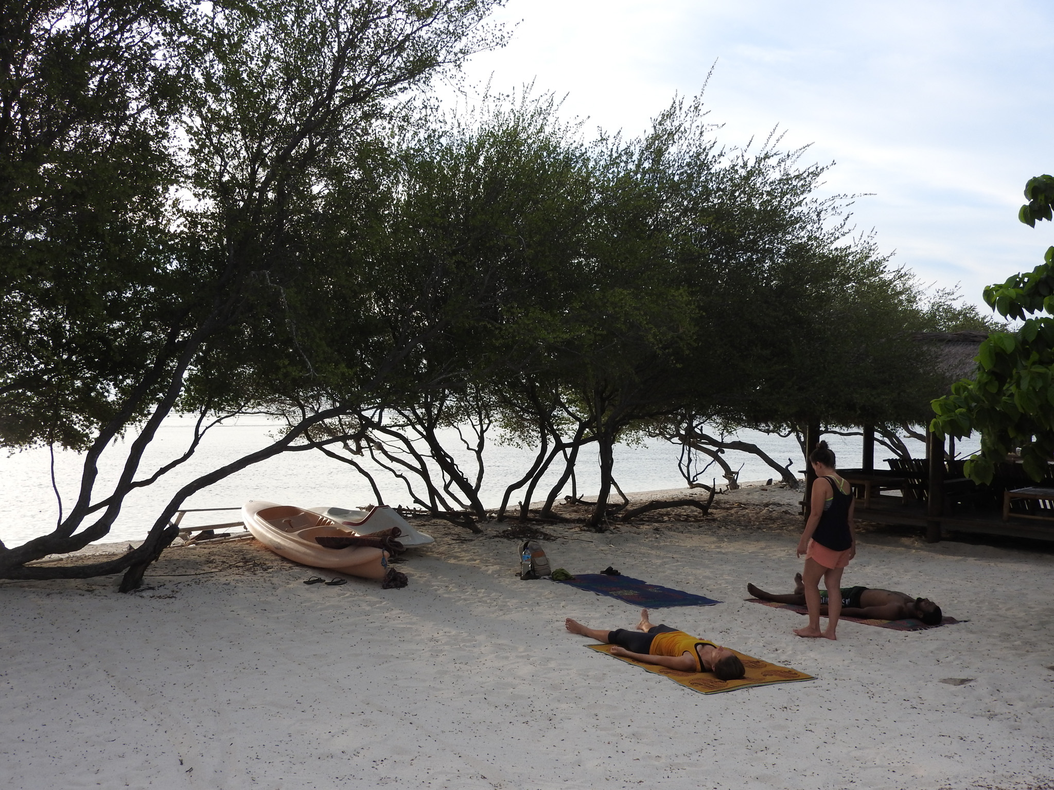 Sunset beach yoga by Ann