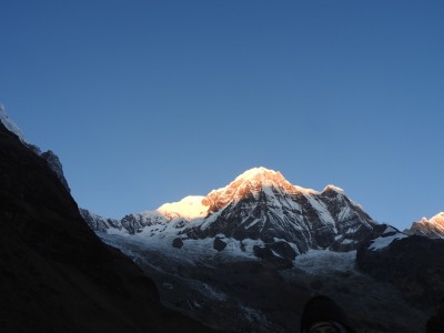 De zon zien opkomen vanop Annapurna Base Camp